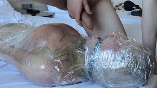 Cute Tranny wrapped in plastic! Flogging! Cumshot in her mouth! Used til she cums!