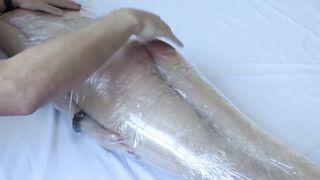 Cute Tranny wrapped in plastic! Flogging! Cumshot in her mouth! Used til she cums!