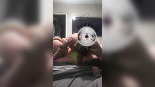 Bunny rides Kravens face while gaming - back view