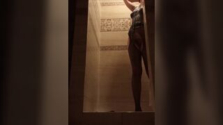 hot shower in garments and stockings