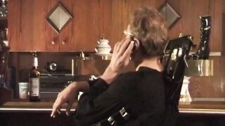 Bound Mature MILF in Latex Teased by Slaver Guy