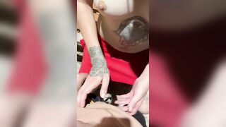 An Asian woman performs blowjob-job on a moaning dude outdoors.
