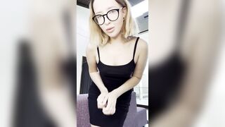 She pulls her skirt aside and spreads her legs wide
