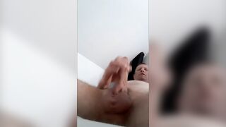 Hot chap plays valuable hard dick and cums moaning on body