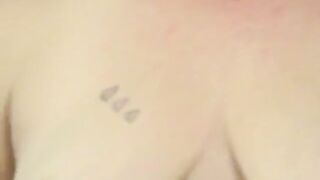 Older Stepmom with big breasts takes off her clothes and fingers her big pussy