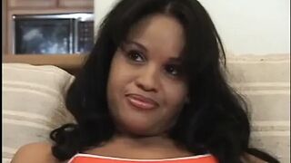 Black doxy wraps her lips around hard penis in advance of getting drilled on the sofa
