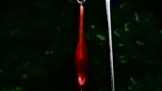 Nasty blonde sticks plastic tube up her ass from behind and loves