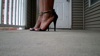 Majesty Feet In Heels Out On Balcony