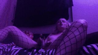 tiny golden-haired bangs herself on web camera
