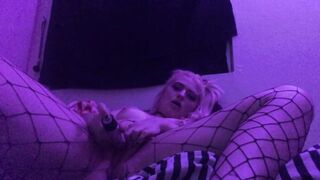 tiny golden-haired bangs herself on web camera