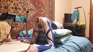 Femboy in an erotic costume Harley Quinn homemade amateur gets her hole drilled by a massive vibrator on a Screw Machine