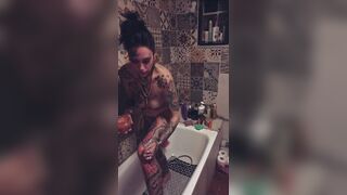 Sexy tattooed milf squirt enjoys her private washroom