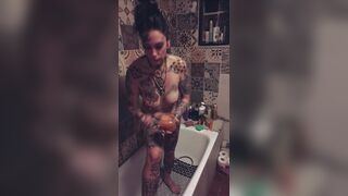 Sexy tattooed milf squirt enjoys her private washroom