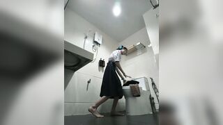 Change into a school uniform in the restroom