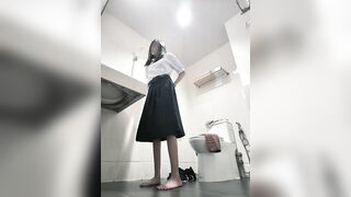 Change into a school uniform in the restroom