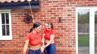 Wet and Bound. Kiki Daniels and Latina in Outdoor Suspension Bondage Ending with a Steamy Lesbian Tub Make Out