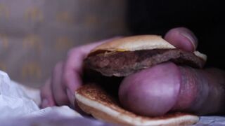 close up - fucking a cheeseburger