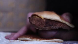 close up - fucking a cheeseburger