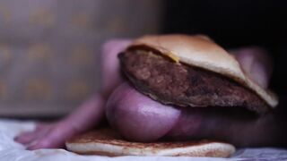 close up - fucking a cheeseburger