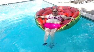 Short Video of BBW Nurse Vicki Floating on Her Massive Watermelon