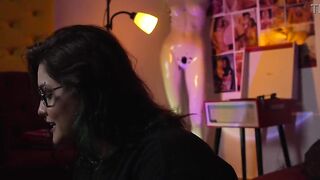 Chunky nerd gal playing RPG with her friend.