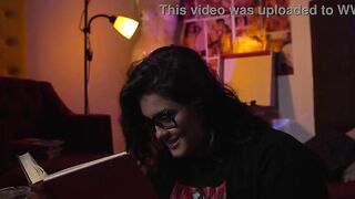 Chunky nerd gal playing RPG with her friend.