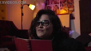 Chunky nerd gal playing RPG with her friend.