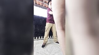 Playing secretly on the balcony during a boring party.