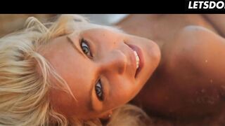 Blonde Fingers Her Exposed Vagina on Sunny Beach Rocks