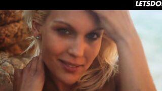 Blonde Fingers Her Exposed Vagina on Sunny Beach Rocks