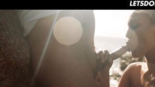 Blonde Fingers Her Exposed Vagina on Sunny Beach Rocks