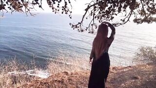 Sexy MILF Artemisia Love outdoor in public by the ocean flashing her flawless tits and smokin' a cigarette