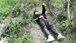 The cute homosexual twink stroking his schlong, pulled through his fly while outdoors, is Jon Arteen