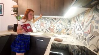 Hawt small real college gal in a plaid school uniform mini skirt flashes her legs and cotton panties in the kitchen