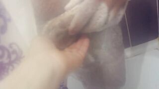 Close-up wife spies on a friend in the shower and sucks swallows cum
