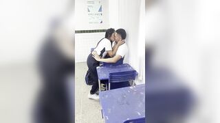 A young 18-year-old hotty giving head to her friend in the classroom.