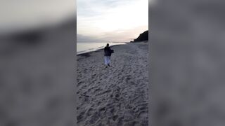 POV. YOU watch as a busty model, unaware of your presence, undresses undressed on the beach, bathes, and plays in the sand.