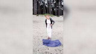POV. YOU watch as a busty model, unaware of your presence, undresses undressed on the beach, bathes, and plays in the sand.