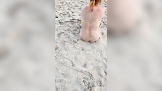 POV. YOU watch as a busty model, unaware of your presence, undresses undressed on the beach, bathes, and plays in the sand.