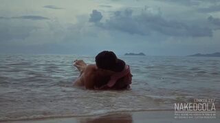 Hottest romantic risky sex in the sea waves on the public beach