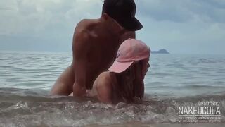Hottest romantic risky sex in the sea waves on the public beach