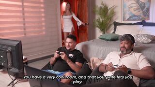 While my husband plays video games, I'm screwing his friend in our bed!