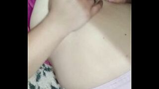 Touching my boobs whilst lying down