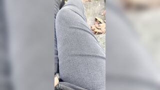 Peeing myself in grey jeans outside