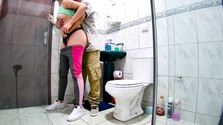 Mistresse getting intimate in the bathroom after a workout.