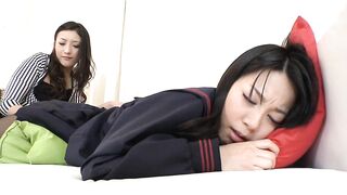 Two asian hairy clams rub through the pantyhoses