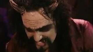 Blonde whore gets fucked in all holes by dudes in devil costumes