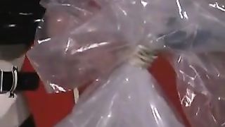 2 latex lesbians doing breath play on sub