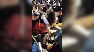 Girls kissing each other in Oktoberfest Blumenau Brazil