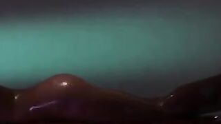 oiled strapon